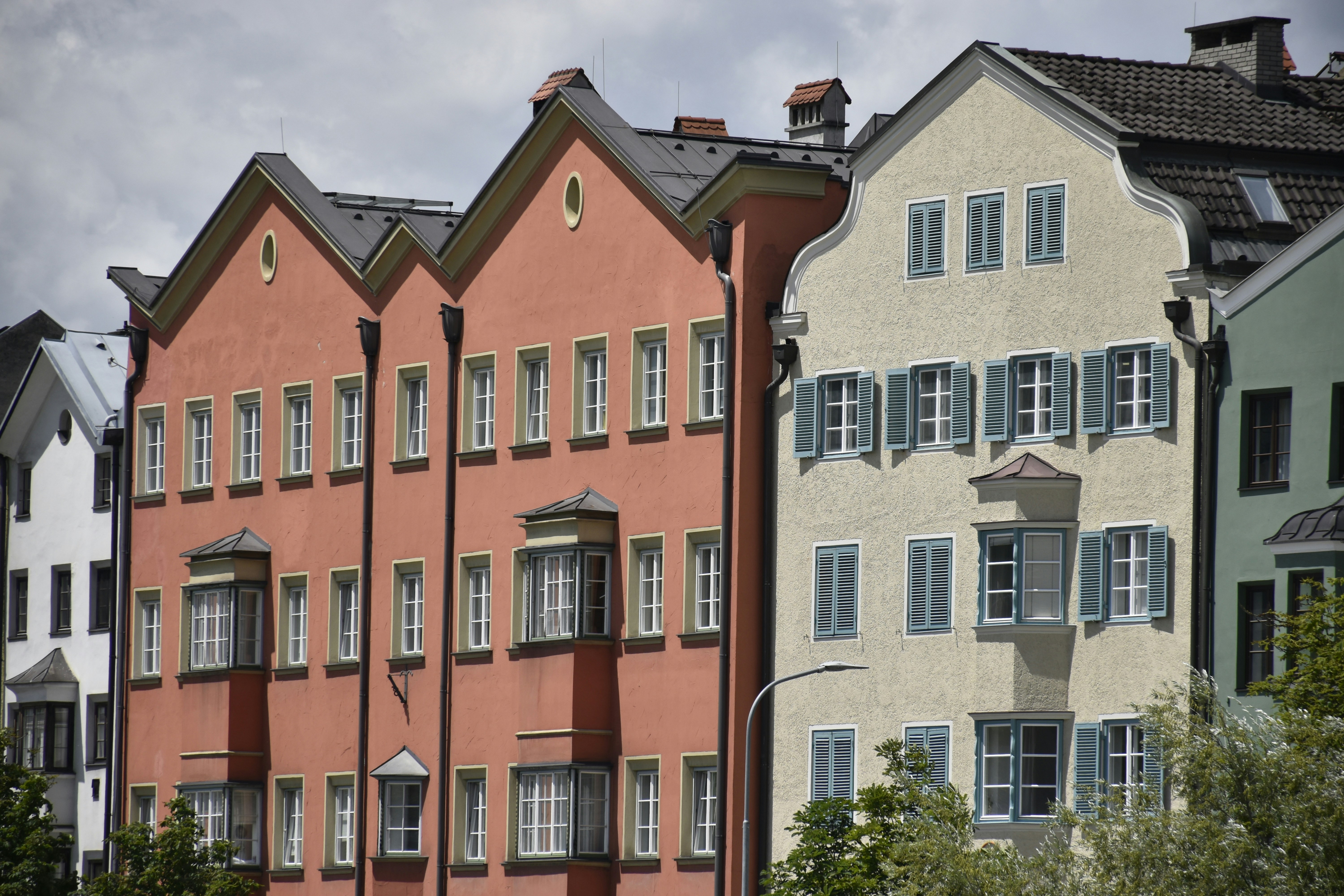 A row of red brick buildings next to each other